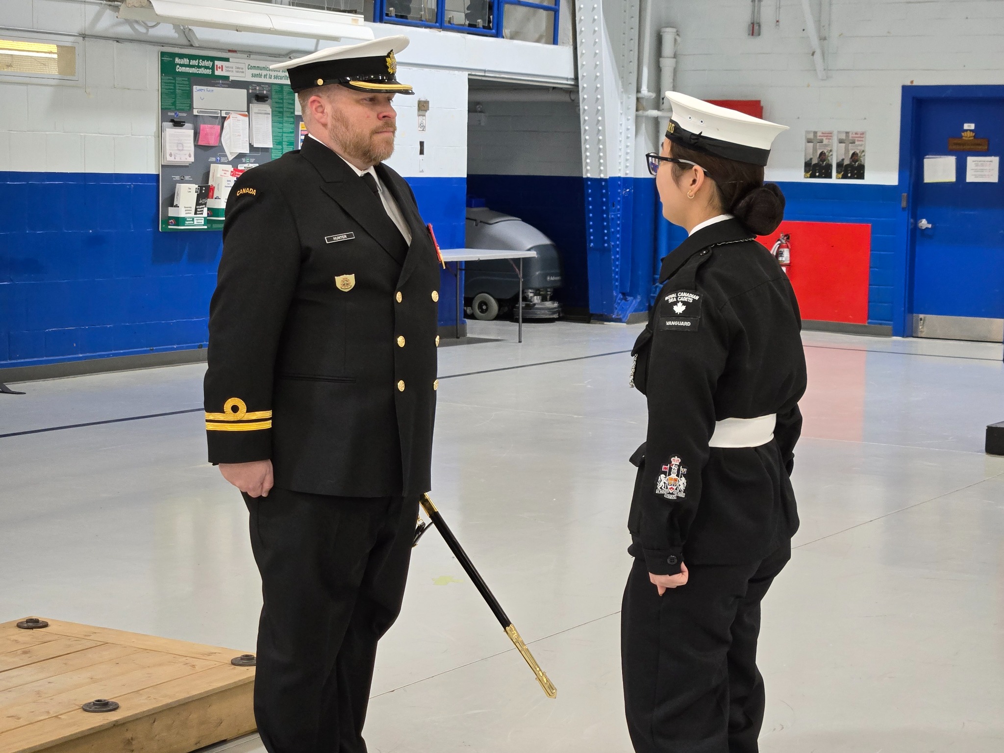 Cadet speaking with officer during training